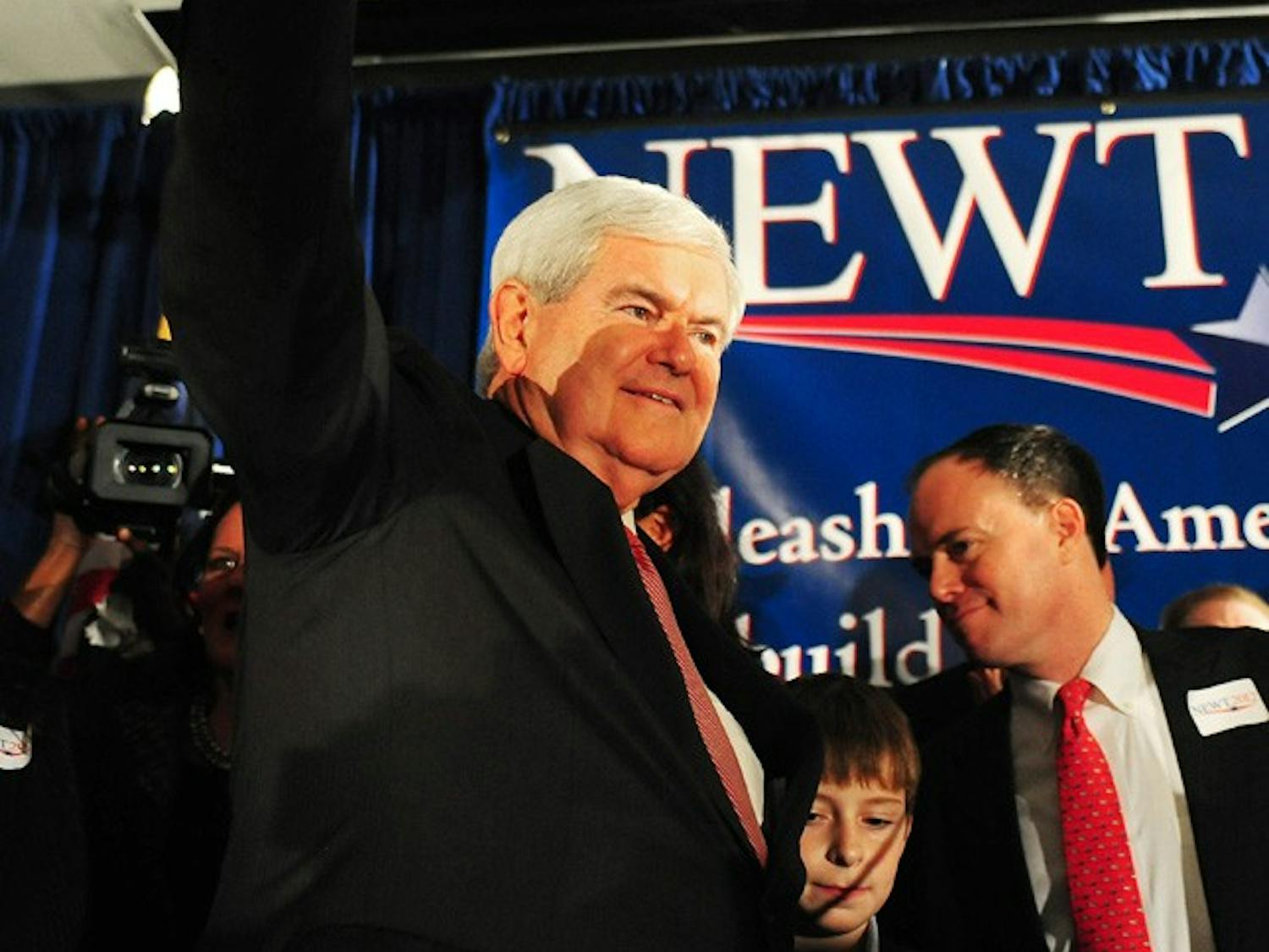 Former Speaker of the House of Representatives and Republican presidential candidate Newt Gingrich waves to supporters at the Hilton Hotel in Columbia, South Carolina, following his victory in the South Carolina Republican presidential primary, Saturday, January 21, 2012. (Jeff Siner/Charlotte Observer/MCT)