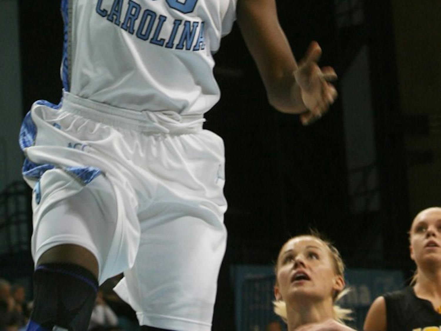 North Carolina forward Laura Broomfield goes up for a layup against Iowa. The 6-foot-1 junior scored 12 points and grabbed 11 rebounds in 20 minutes of action. It was her first double-double this year.