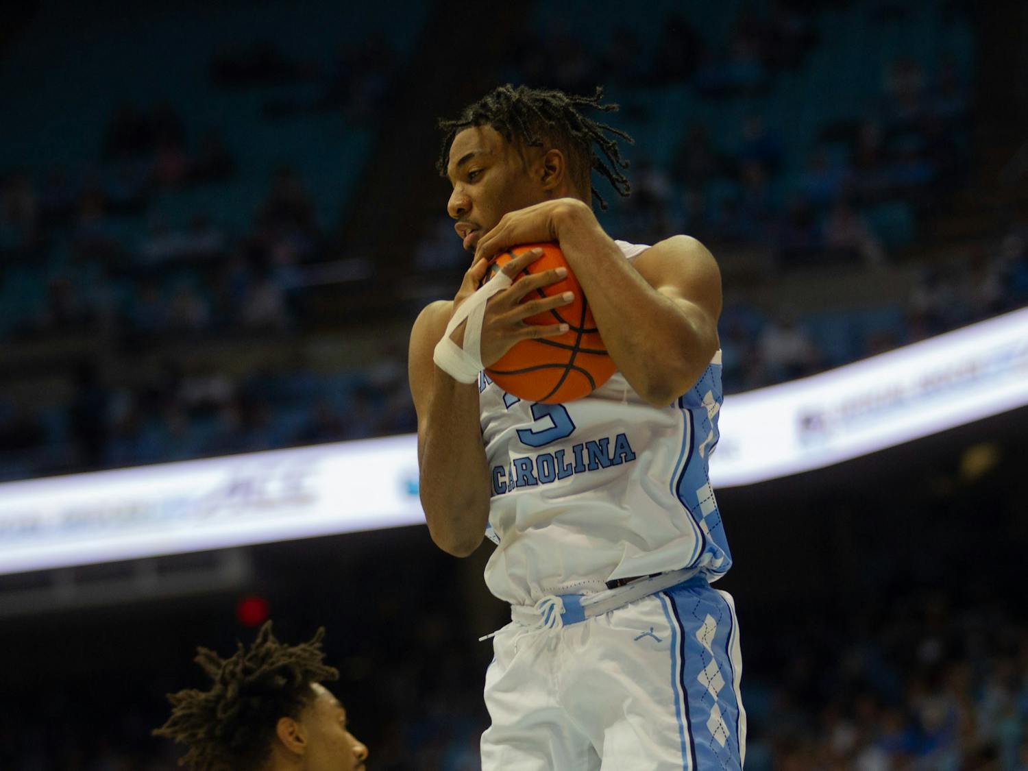 UNC freshman guard and forward Dontrez Styles (3) catches a rebound at a UNC men's basketball game against Pittsburgh in the Dean Smith Center on Wednesday, Feb. 16, 2022. Pittsburgh won 76-67.