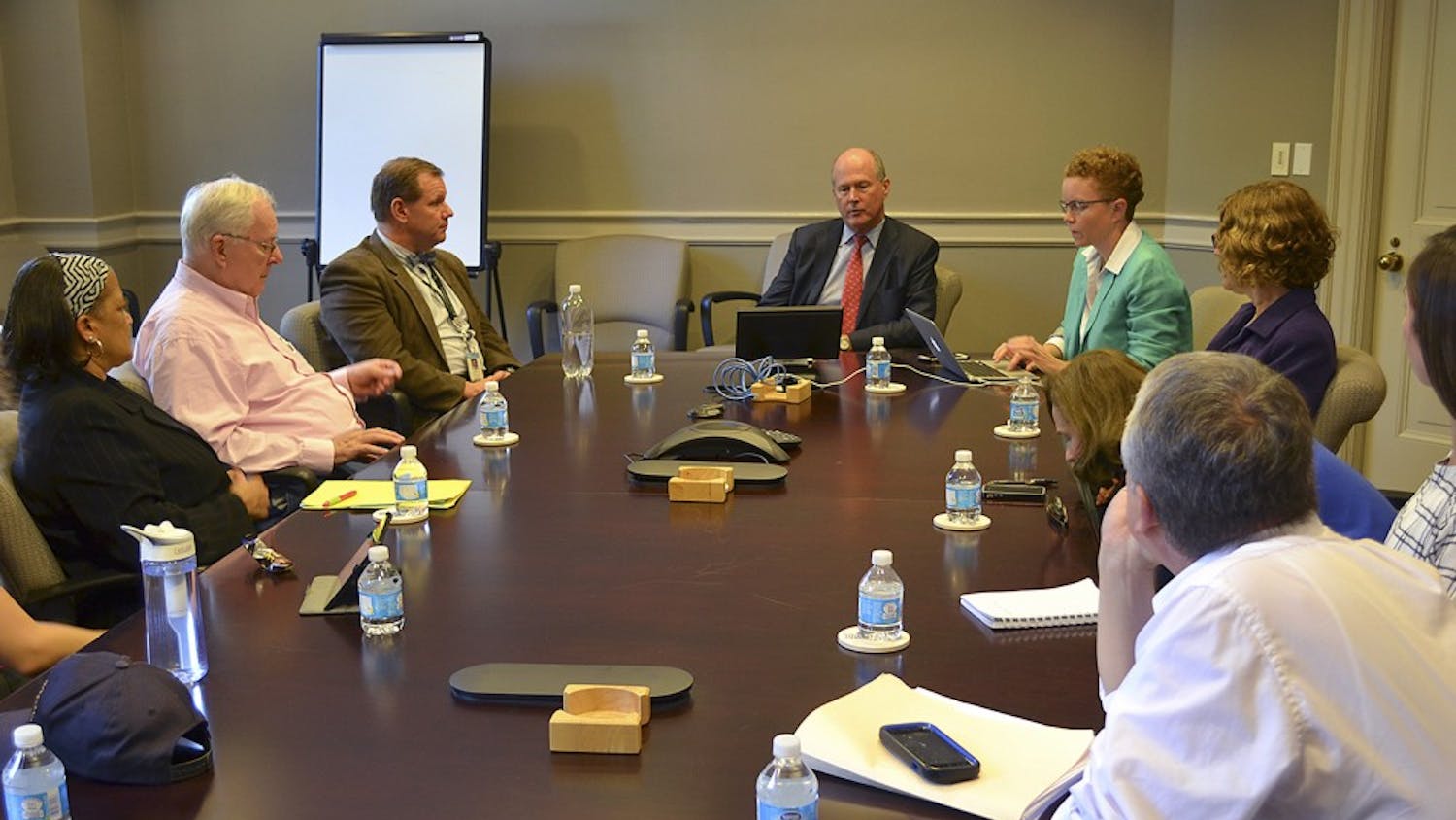 Faculty members gather Monday afternoon in South building for the Faculty Executive Committee meeting.  The meeting, which was led by Executive Vice Chancellor and Provost James W. Dean Jr, covered student binge drinking. 