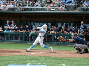 UNC sophomore infielder Johnny Castagnozzi (19) takes a swing at the ball during a baseball game against Georgia Tech at Boshamer Stadium on Saturday, April 16, 2022. UNC won 10-5.