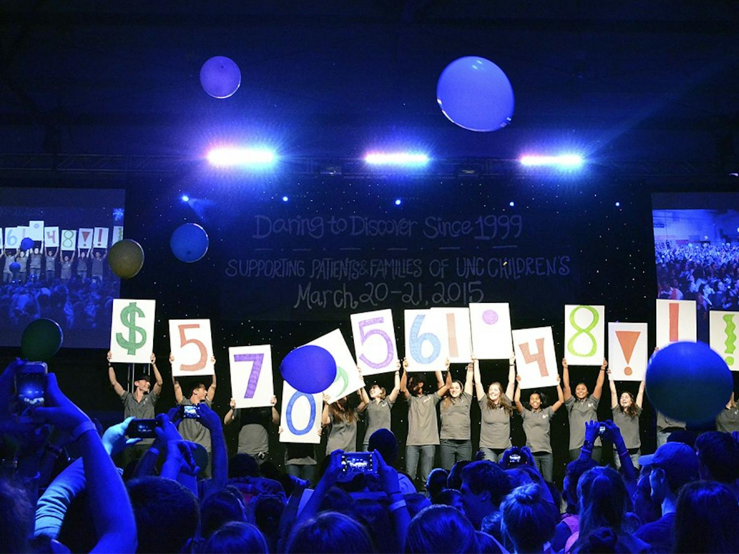Students who participated in the 2015 UNC Dance Marathon celebrate Saturday night in Fetzer Gym after raising $570,561.41 for the patients at North Carolina Children's Hospital.