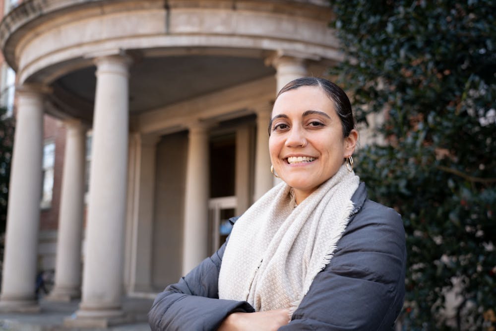 Emily Chávez, the Project Director for Diverse and Resilient Educators Advised through Mentorship (DREAM), stands outside of Peabody Hall, which houses the UNC School of Education, on Wednesday, Jan. 2, 2022.