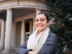 Emily Chávez, the Project Director for Diverse and Resilient Educators Advised through Mentorship (DREAM), stands outside of Peabody Hall, which houses the UNC School of Education, on Wednesday, Jan. 2, 2022.
