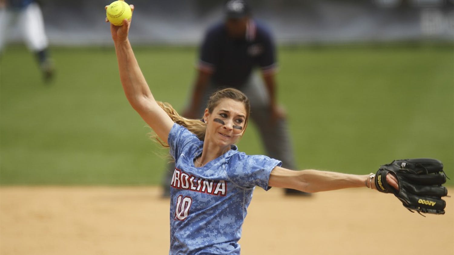 UNC pitcher, Lori Spingola, winds up a pitch against a Maryland opponent.  The Tar Heels defeated the Terps 11-5 in the first game of their double-header Saturday.