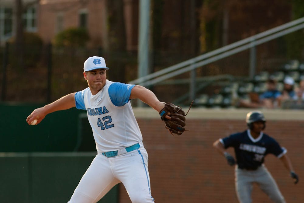 <p>UNC junior Jake Knapp pitches for the Tar Heels in their 10-0 victory over Longwood on Wednesday, Feb. 22, at Boshamer Stadium.</p>