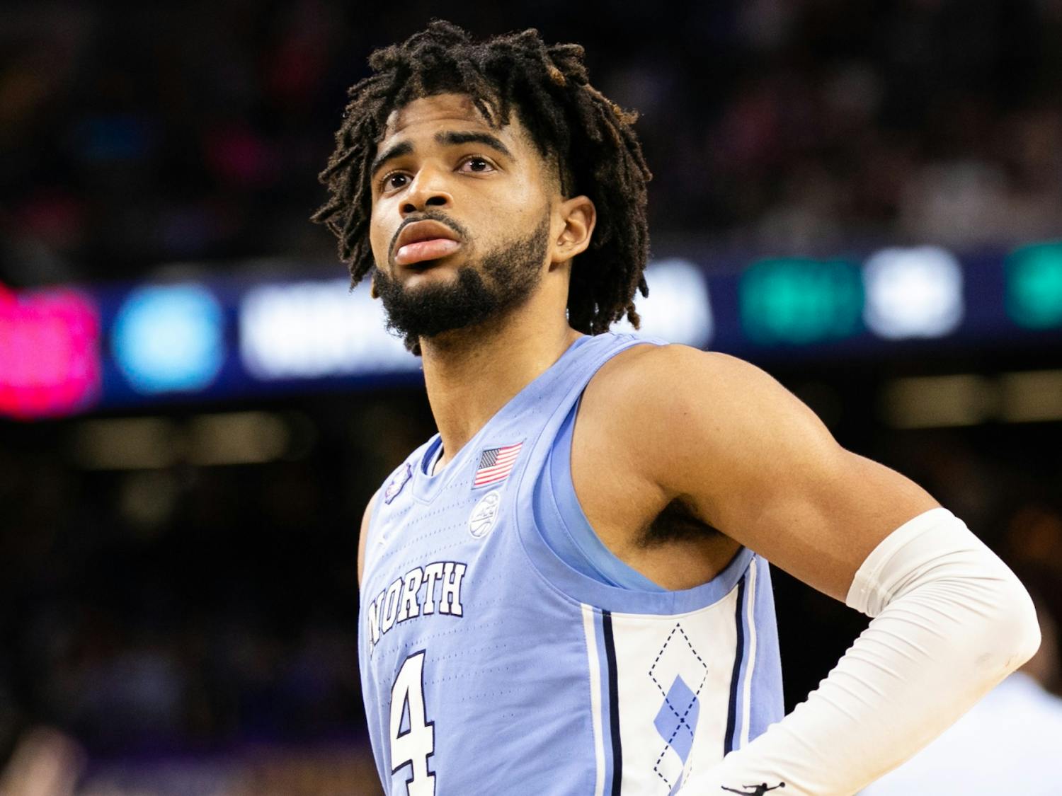 UNC sophomore guard RJ Davis (4) begins to tear up during the final seconds of the NCAA championship game against Kansas in New Orleans on Monday, April 4, 2022. UNC lost 72-69.