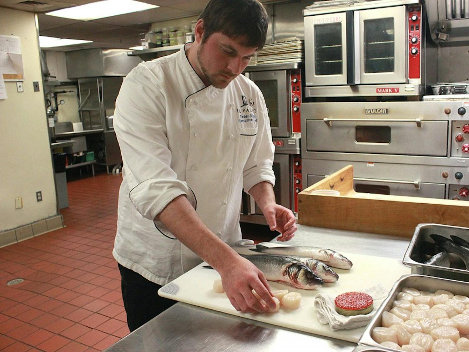 Teddy Diggs, head chef at Il Palio, is pictured on Tuesday afternoon in the restaurant's kitchen. On the relationship between fish suppliers and chefs, Diggs commented "You really have to trust the person you're buying from."