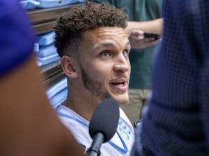 Pete Nance, a graduate transfer from Northwestern, speaks with reporters at a press conference in the Dean E. Smith Center on July 18, 2022.