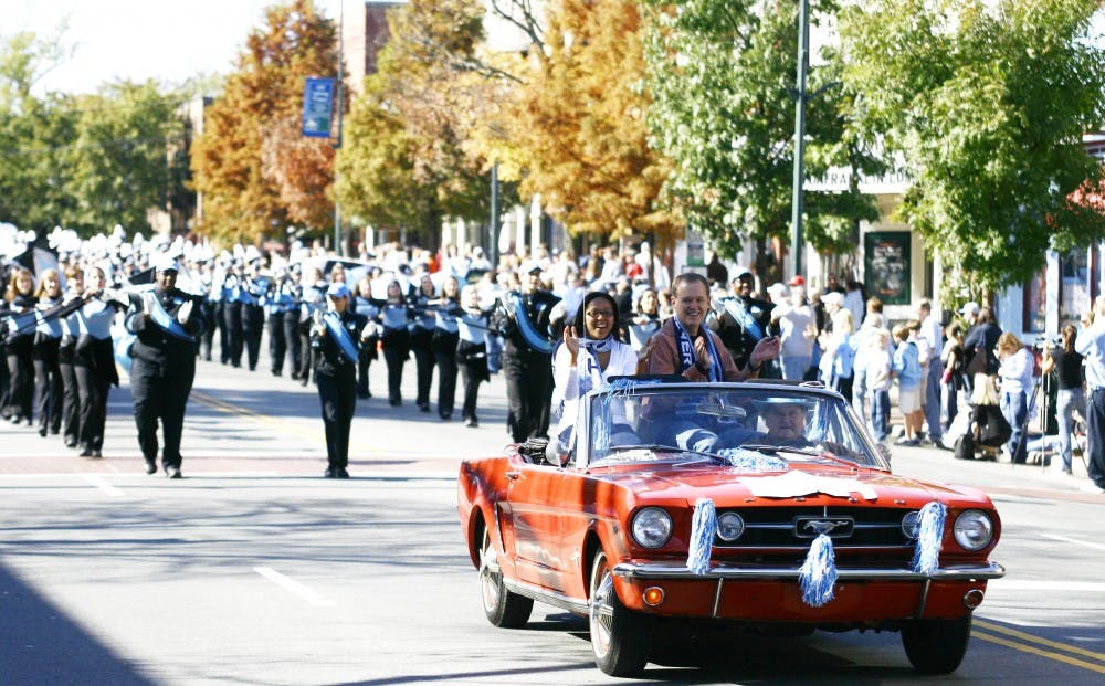 Student Body President Jasmin Jones rides in the parade that she helped organize, reviving a longstanding Homecoming tradition. Students and alumni gathered along Franklin St. Saturday morning for the first Homecoming parade since 1993. The parade started on S. Columbia and ended on Raleigh St.