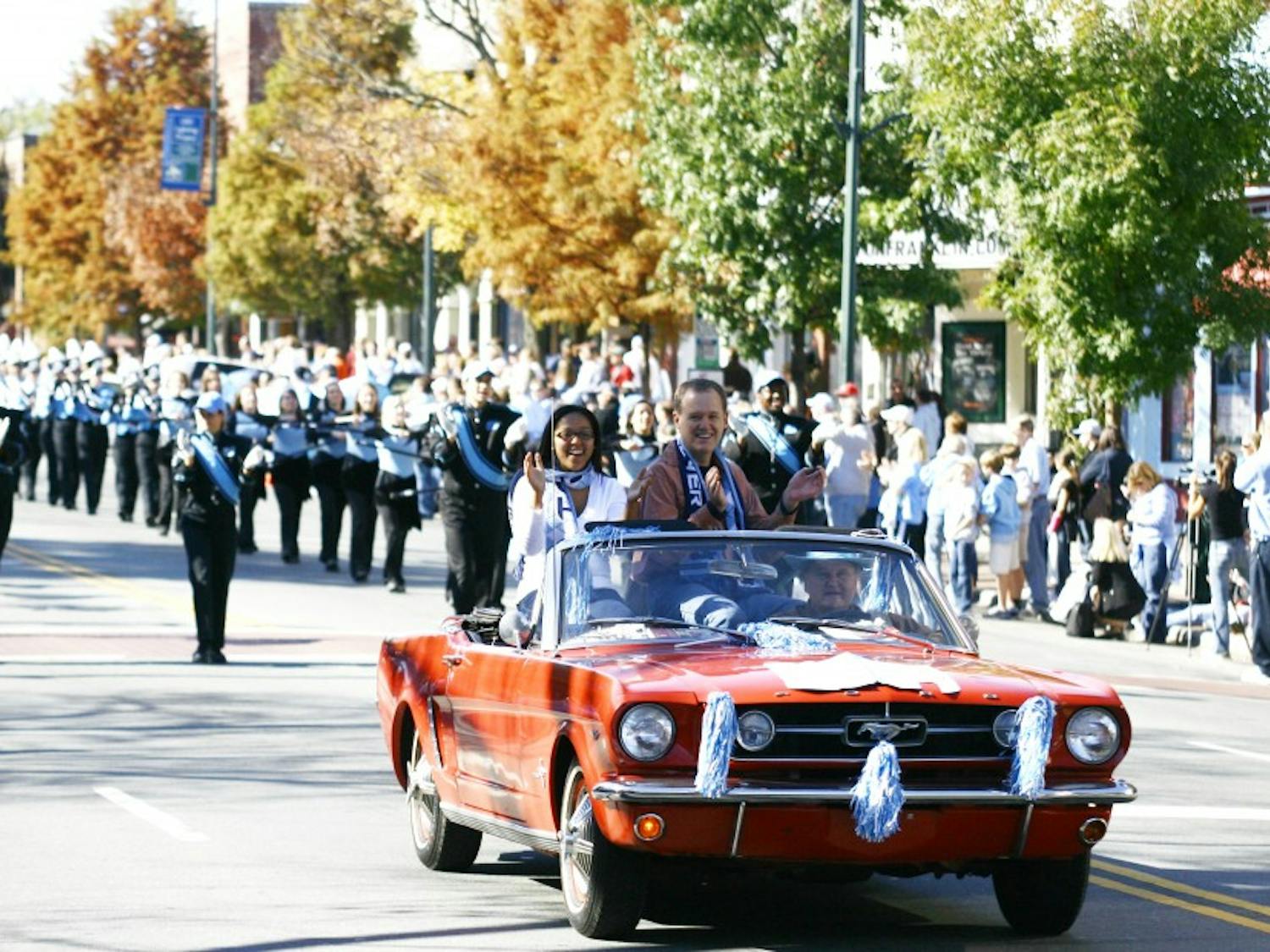 Student Body President Jasmin Jones rides in the parade that she helped organize, reviving a longstanding Homecoming tradition. Students and alumni gathered along Franklin St. Saturday morning for the first Homecoming parade since 1993. The parade started on S. Columbia and ended on Raleigh St.