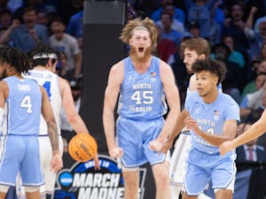 Graduate transfer forward Brady Manek (45) screams after he scores a basket at the NCAA Sweet 16 game against No. 4 seed UCLA on March 25, 2022 at the Wells Fargo Center in Philadelphia, PA. UNC won 73-66 and is advancing to the Elite 8. 