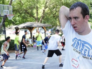 Michael Nager stands on the sideline after playing basketball at Extraordinary Ventures.