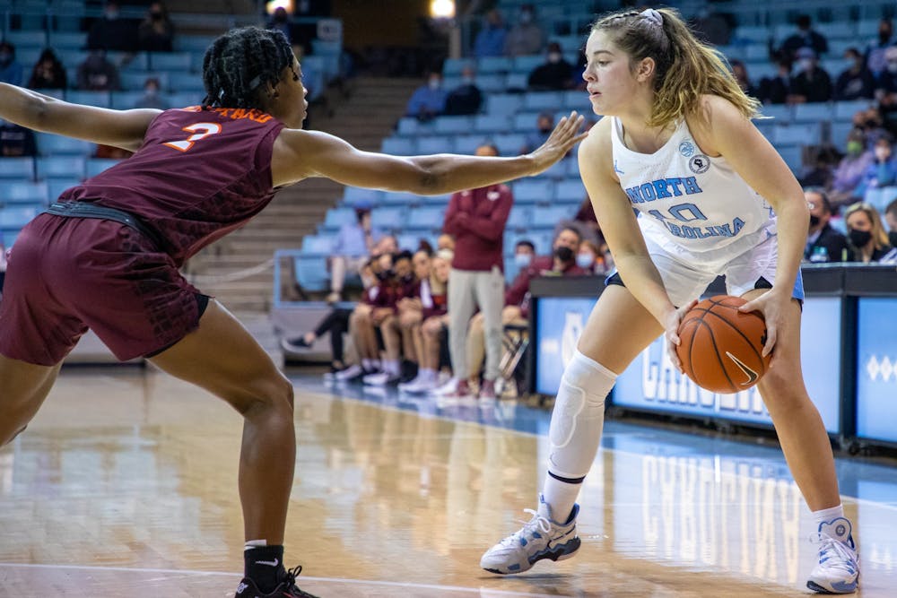 Junior guard Eva Hodgson (10) prepares to move past a defender during the game against Virginia Tech at Carmichael Arena on Jan. 9th, 2022. UNC won 71-46.