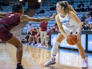 Junior guard Eva Hodgson (10) prepares to move past a defender during the game against Virginia Tech at Carmichael Arena on Jan. 9th, 2022. UNC won 71-46.