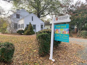 A home for sale sign stands on East Patterson Place in Chapel Hill on Nov. 10, 2022. Chapel Hill needs more housing as interest rates and housing prices are increasing.