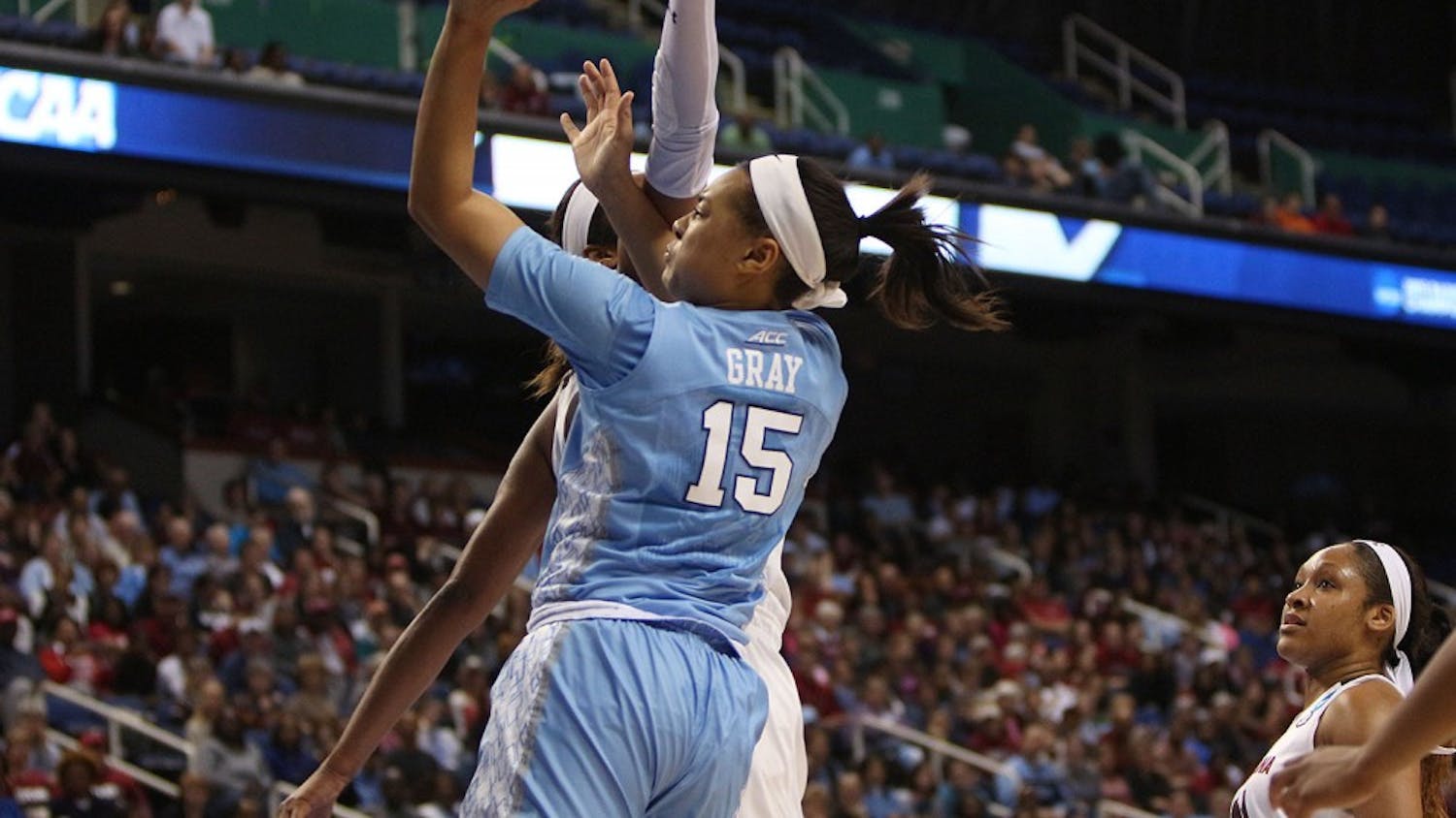 Guard Allisha Gray (15) charges toward the basket for a lay up. 