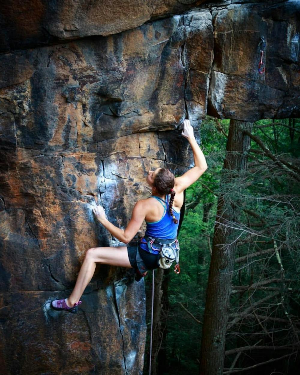 Kerry Scott, a UNC student, climbs&nbsp;Scenic Adult at the New River Gorge. Photo courtesy Michael Drake.&nbsp;