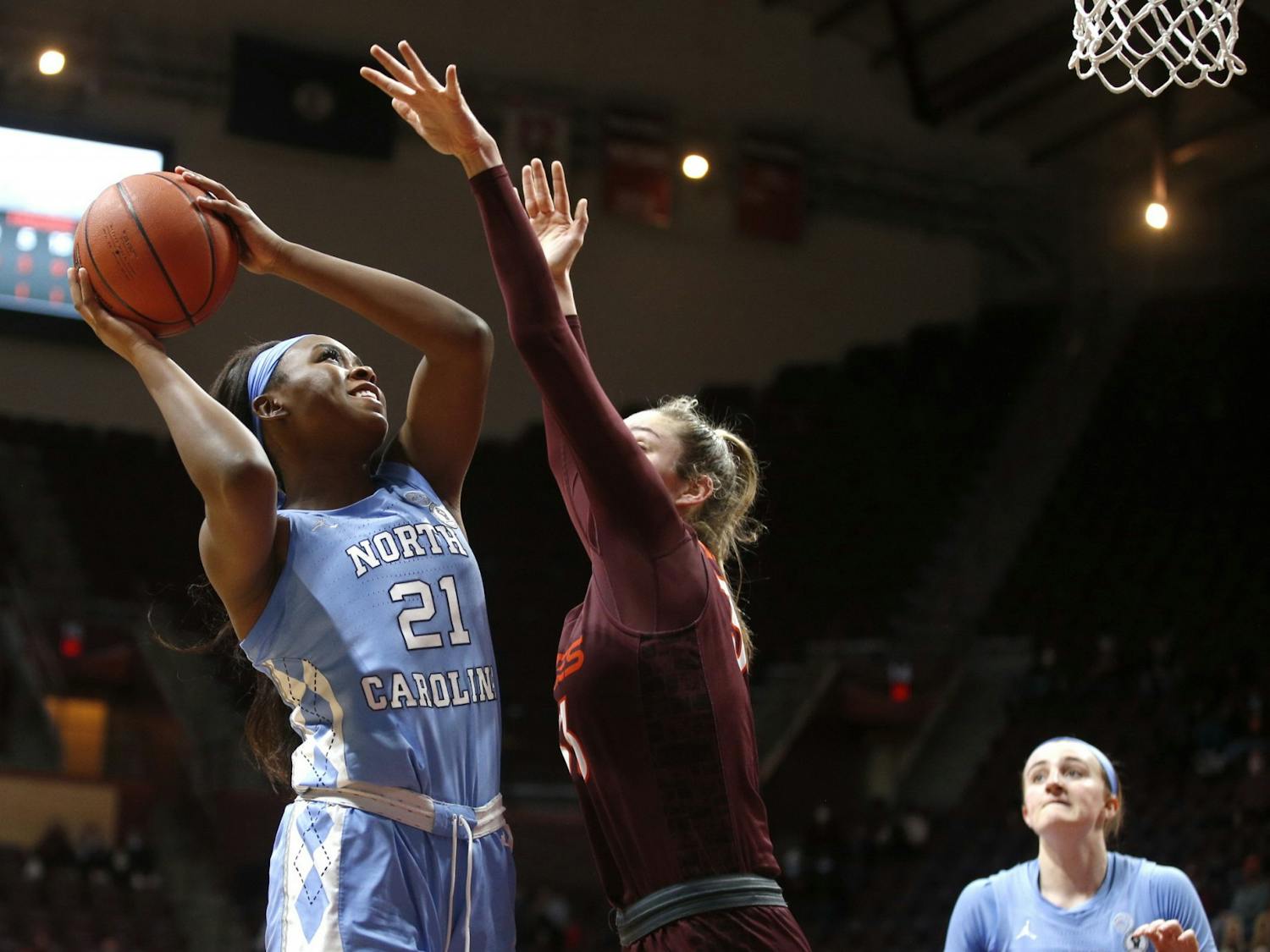 UNC's sophomore forward Malu Tshitenge (21) attempts a layup during a game against Virginia Tech on Sunday, Jan. 31, 2021. UNC fell to VT 69-73. Photo courtesy of Jon Fleming.