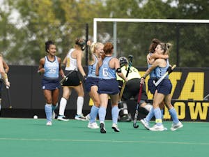 UNC field hockey players celebrate at the game vs Iowa in Iowa City on Aug. 29. The Tar Heels lost 1-3. Photo courtesy of Iowa Athletics. 