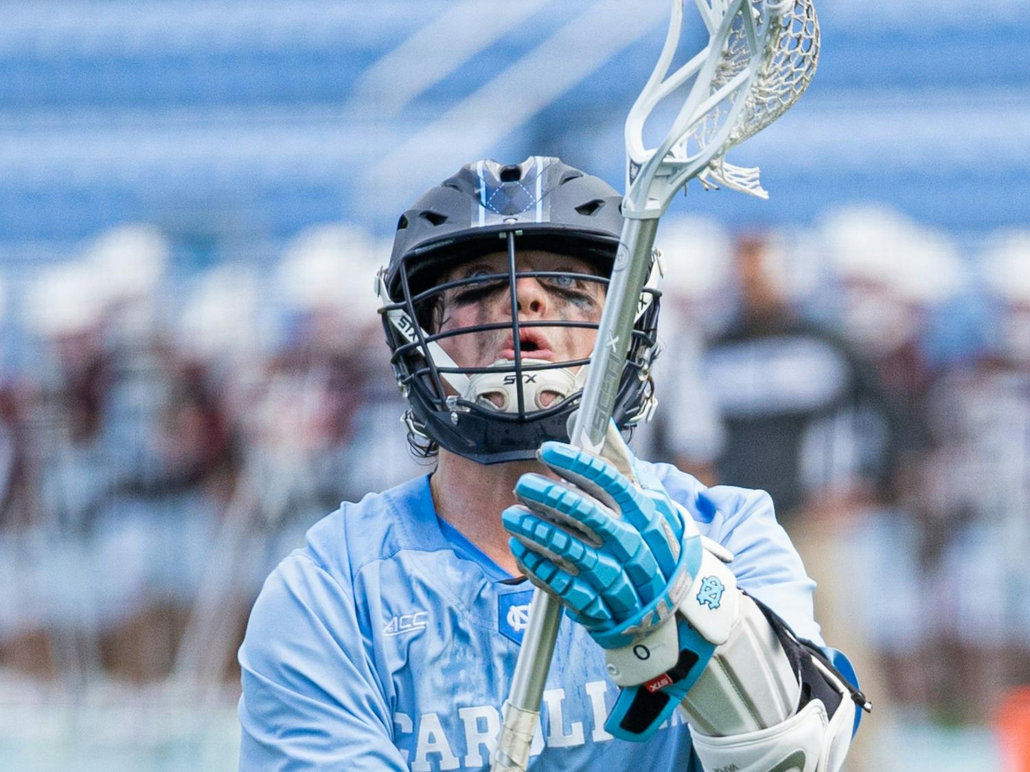 Junior attackman Lance Tillman (0) prepares to catch a pass during a men's lacrosse game in Dorrance Stadium against Brown University on Wednesday, Feb. 23, 2022. UNC won 14-11.