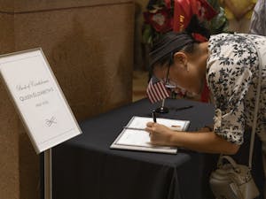 Elizabeth Ballou of Wake Forest pays her respects at the Capital Building in Raleigh, NC on September 16th, 2022