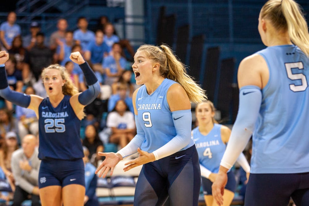 <p>UNC sophomore outside hitter Mabrey Shaffmaster (9) celebrates getting a point during volleyball match against Michigan on Saturday, Sept. 10, 2022, at Carmichael Arena. Michigan beat UNC 3-0.</p>