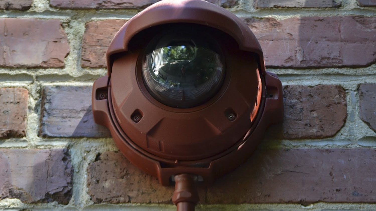 Cameras have been installed on Graham Memorial Hall and Hyde Hall to provide surveillance to the statue of "Silent Sam" on Monday morning Sept. 14. The camera on Graham Memorial can be found in the corner of the building, notable by its red piping.