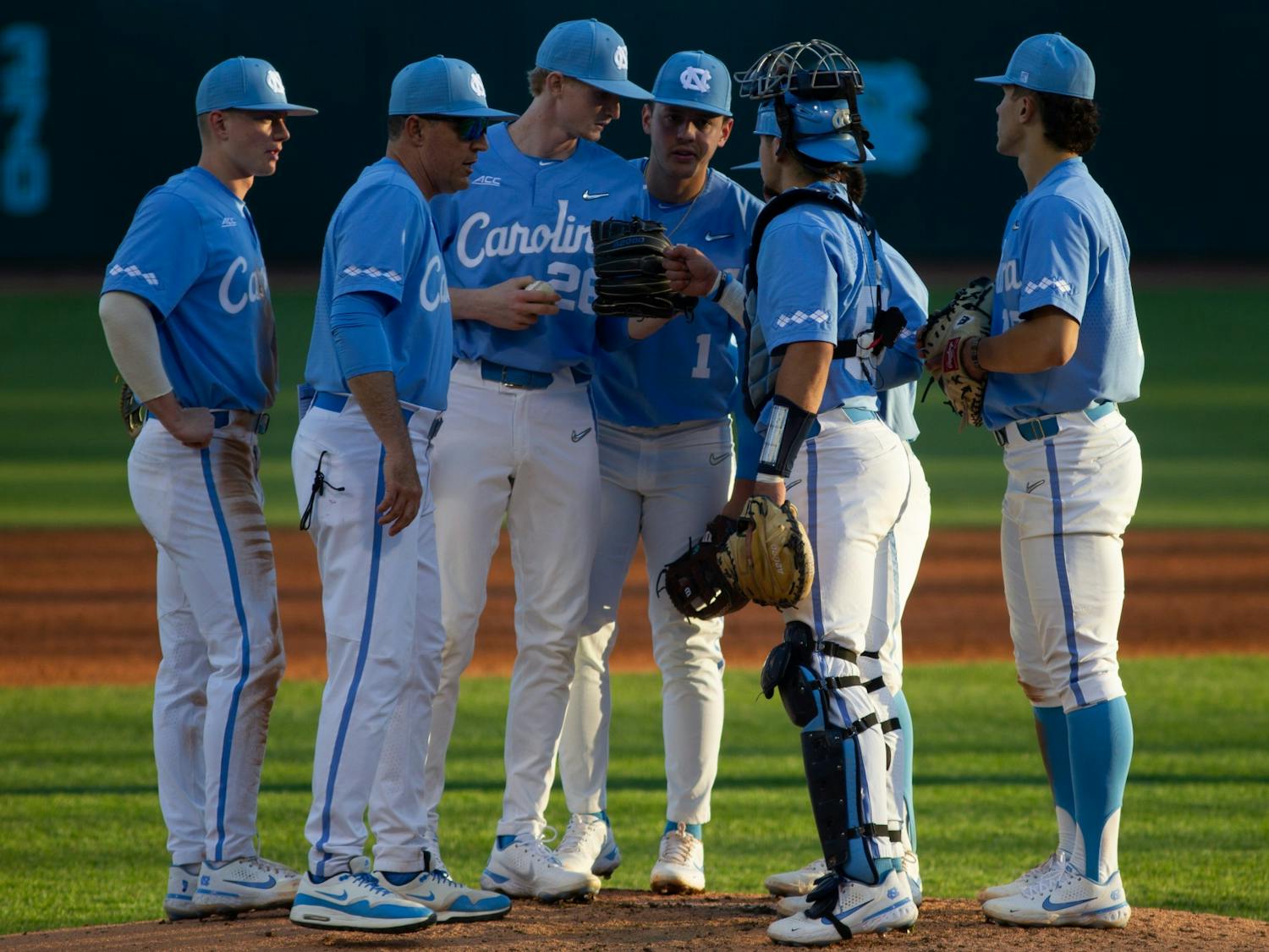 The team meets on the pitcher's mound during a UNC men’s baseball game against Longwood on Tuesday, March 1, 2022, at Boshamer Stadium.