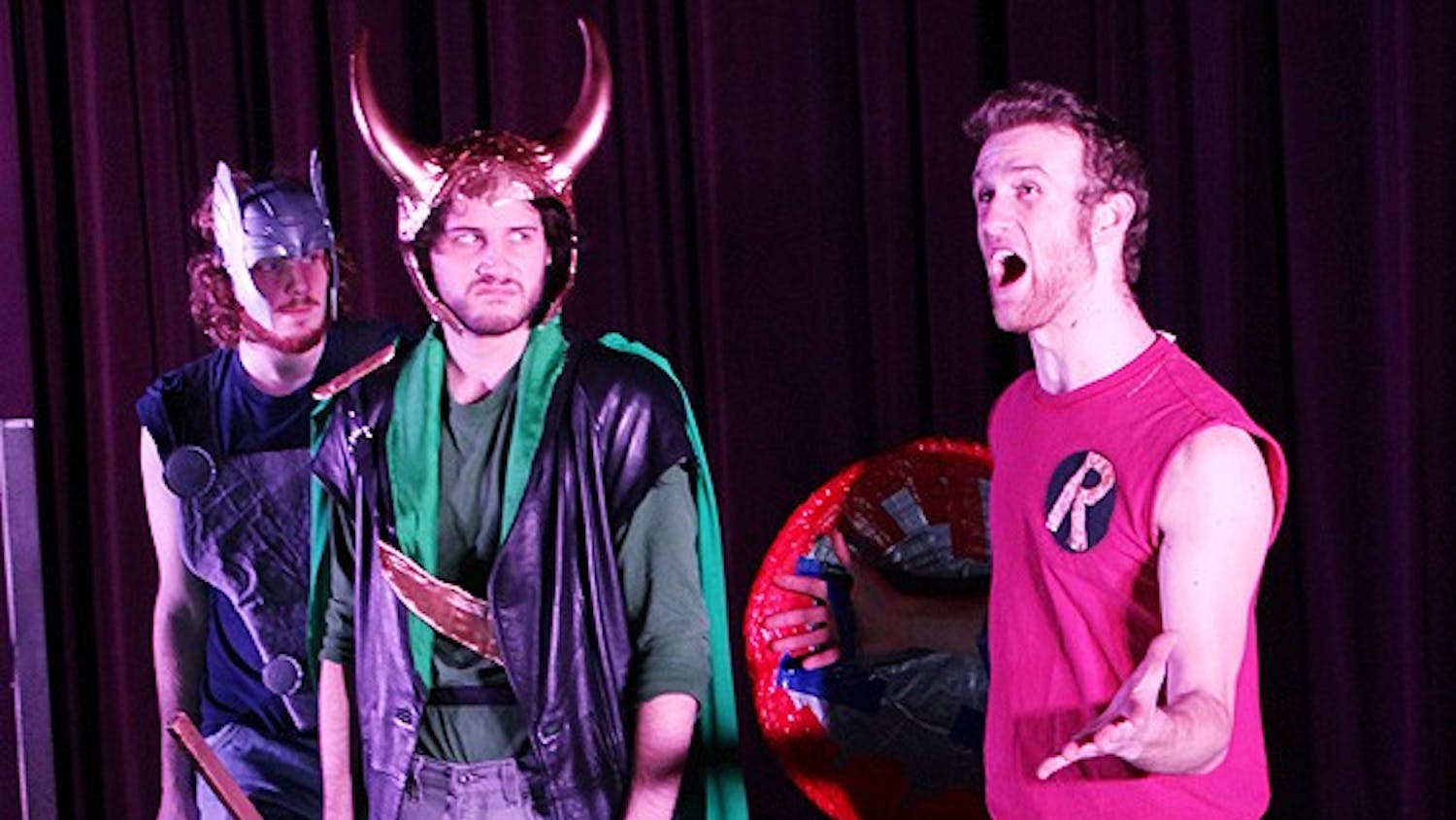 The Pauper Players rehearsed their upcoming show, Broadway Melodies, in the Hanes Art Center auditorium on Thursday night. Matt Verner, Quinn Matney, and Richard Walden play characters in The Avengers Convention. 