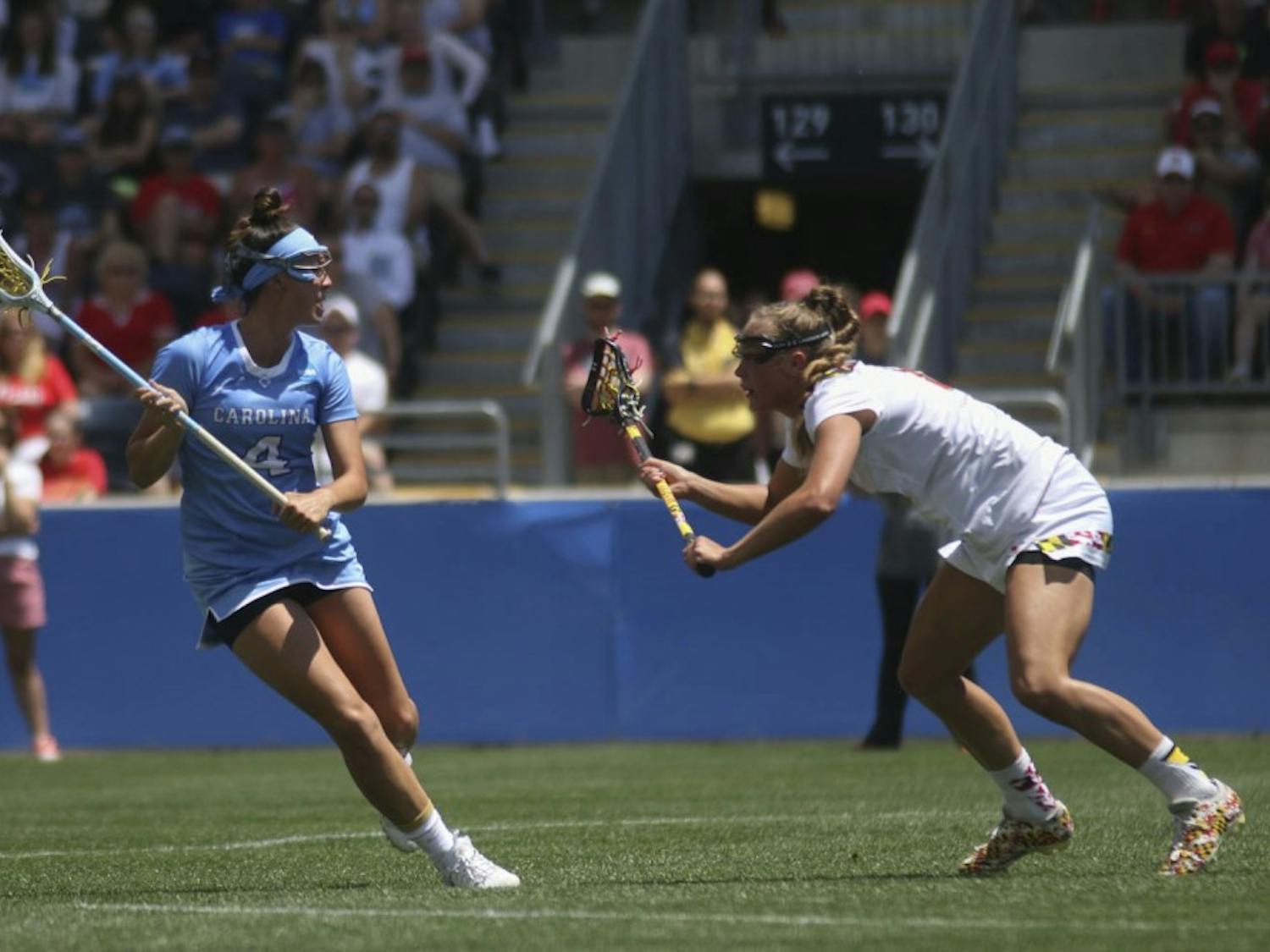 UNC midfielder Marie McCool looks for an open teammate to pass to. The North Carolina women's lacrosse team defeated Maryland 13-7 to capture the NCAA championship on May 29, 2016&nbsp;at Talen Energy Stadium in Chester, PA.