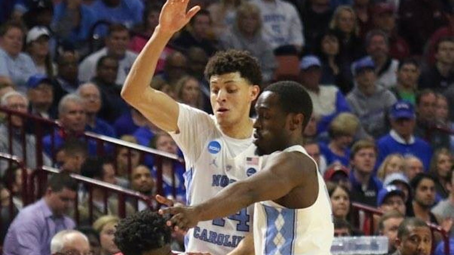 North Carolina wings&nbsp;Justin Jackson (44) and Theo Pinson (1) use their length to disrupt the Arkansas ball-handler&nbsp;in UNC's second-round win over the Razorbacks.