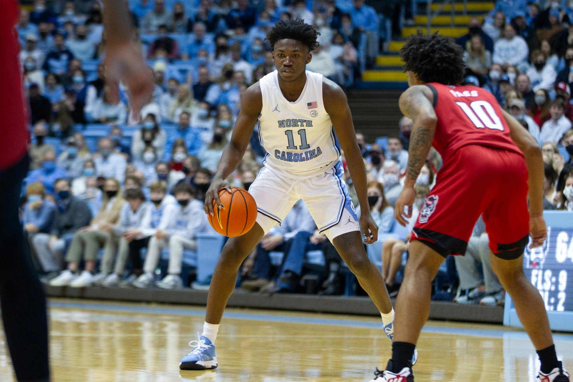 Dunn's energy helps Tar Heels pull away from Louisville in 80-59