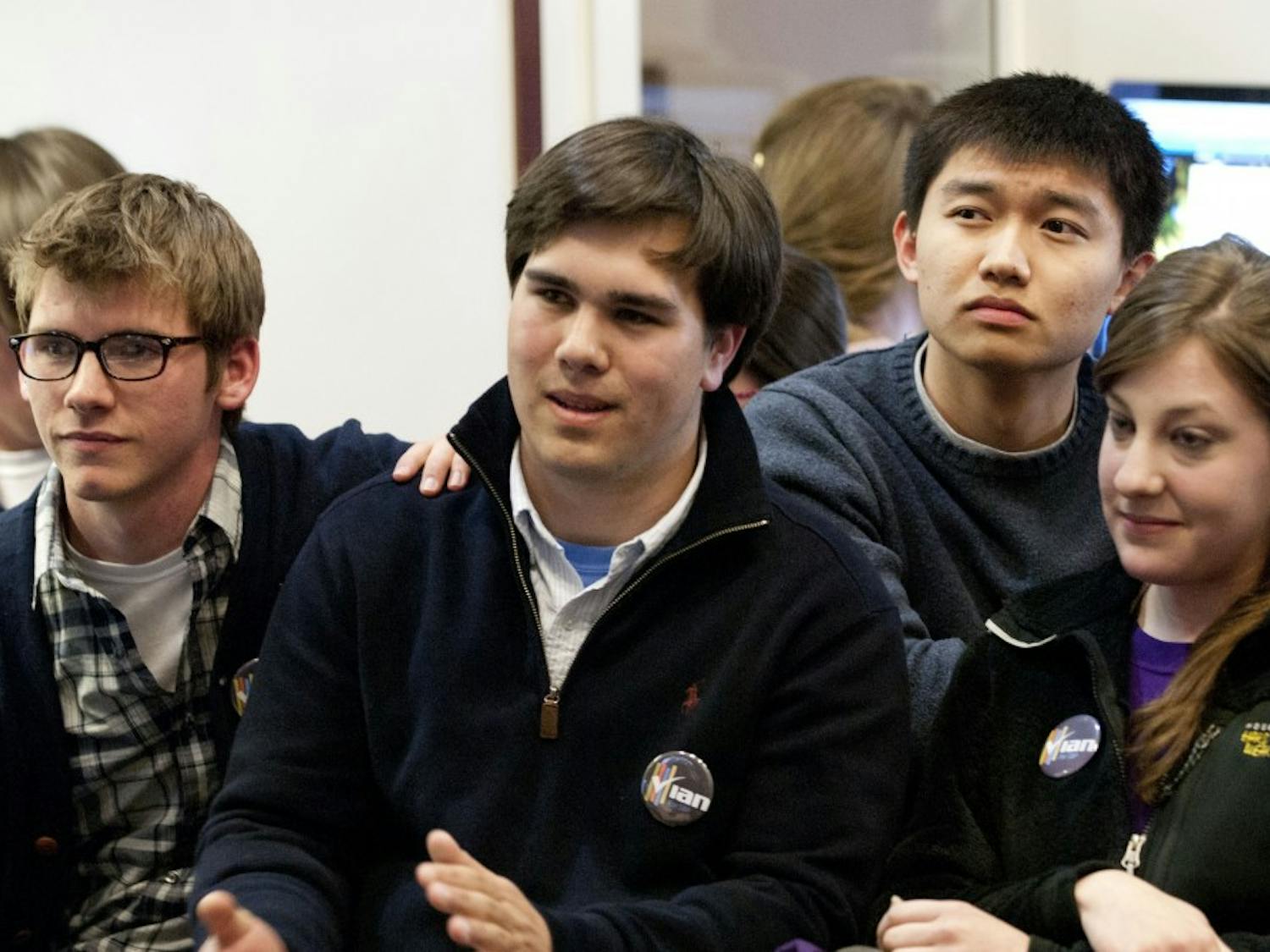 	Ian Lee and his supporters react to the news of Mary Cooper&#8217;s 62 percent student body president win. 
