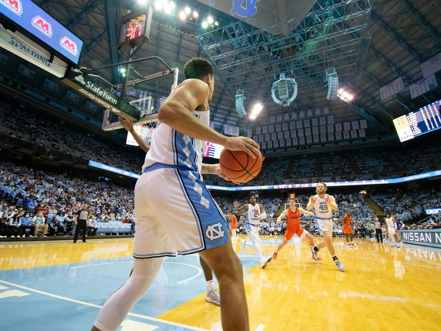 UNC junior forward Justin McKoy throwing the ball in during UNC Men's basketball's home game against Virginia Tech on Monday, Jan. 24, 2022, at the Dean Smith Center.