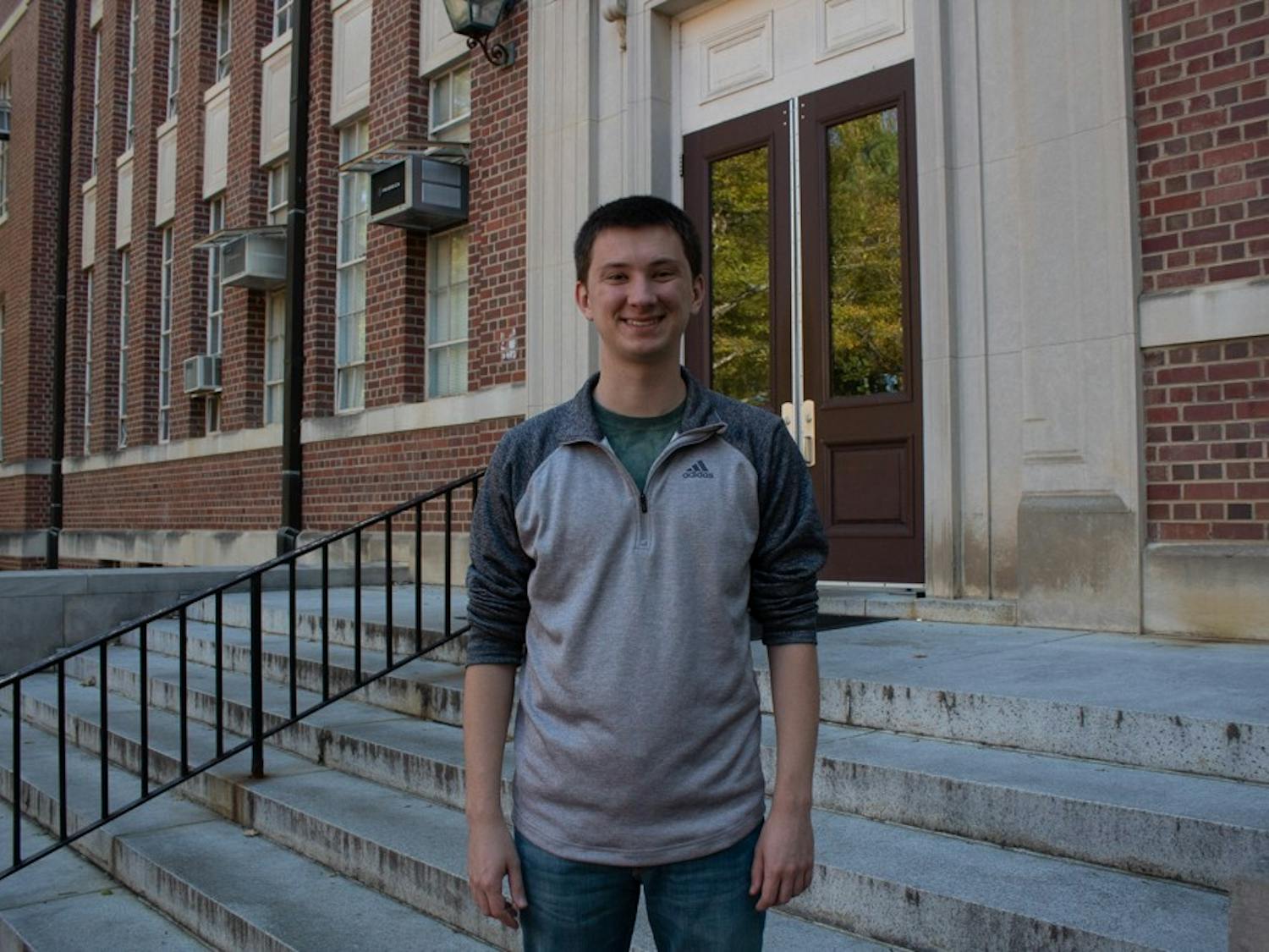 Jackson Trice, a senior economics major, stands in front of Gardner Hall, home to UNC's department of economics on Wednesday, Nov.6, 2019.