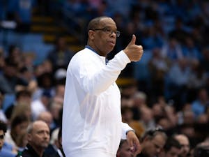 UNC head coach, Hubert Davis, gestures to his players in the Dean Smith Center on Jan. 4, 2023, against the Wake Forest Deamon Deacons.