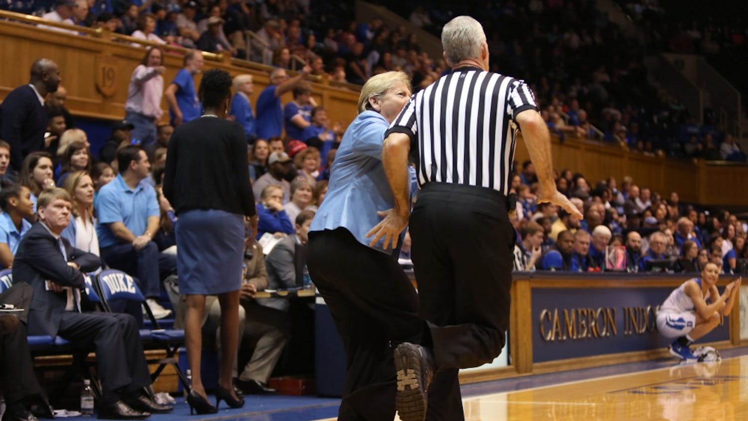 Head coach Sylvia Hatchell collides with a referee for a technical foul.&nbsp;
