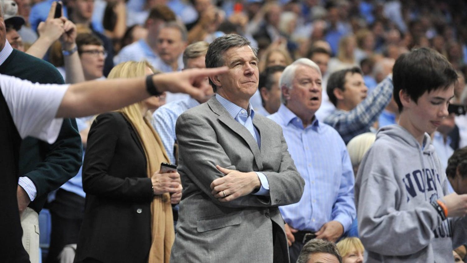 N.C. Governor Roy Cooper looks on at the UNC-Duke game.&nbsp;