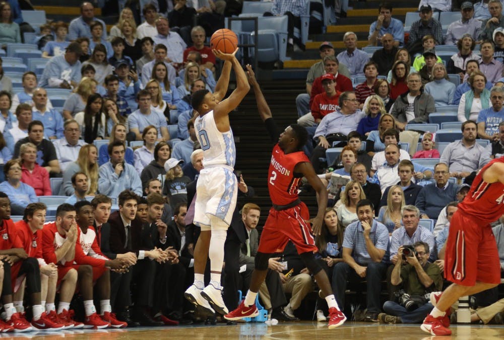 Guard Nate Britt (0) pulls up for&nbsp;a three. Britt led the team with 17 points.