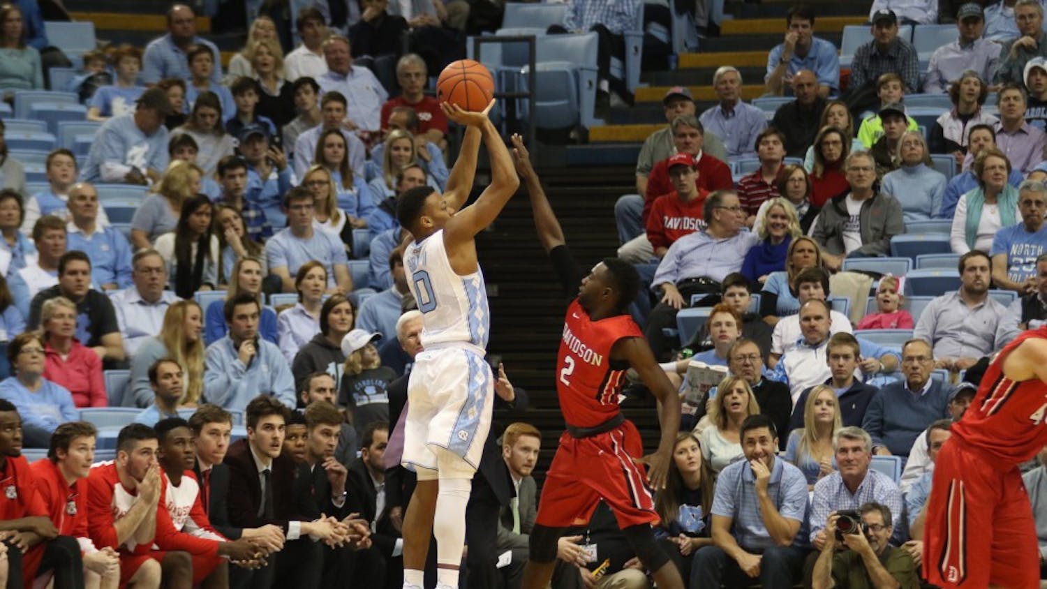 Guard Nate Britt (0) pulls up for&nbsp;a three. Britt led the team with 17 points.