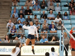UNC redshirt first-year Lauren Harrison (25) jumps for the ball at the game against Syracuse on Friday, October 26th in the Carmichael Arena. UNC won 3-1. 