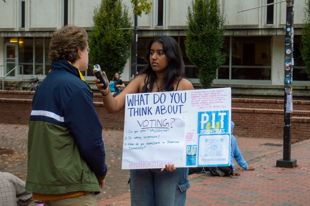UNC sophomore Sritha Chilumula interviews a student in the Pit for Pit Perspectives on Oct. 13, 2022.