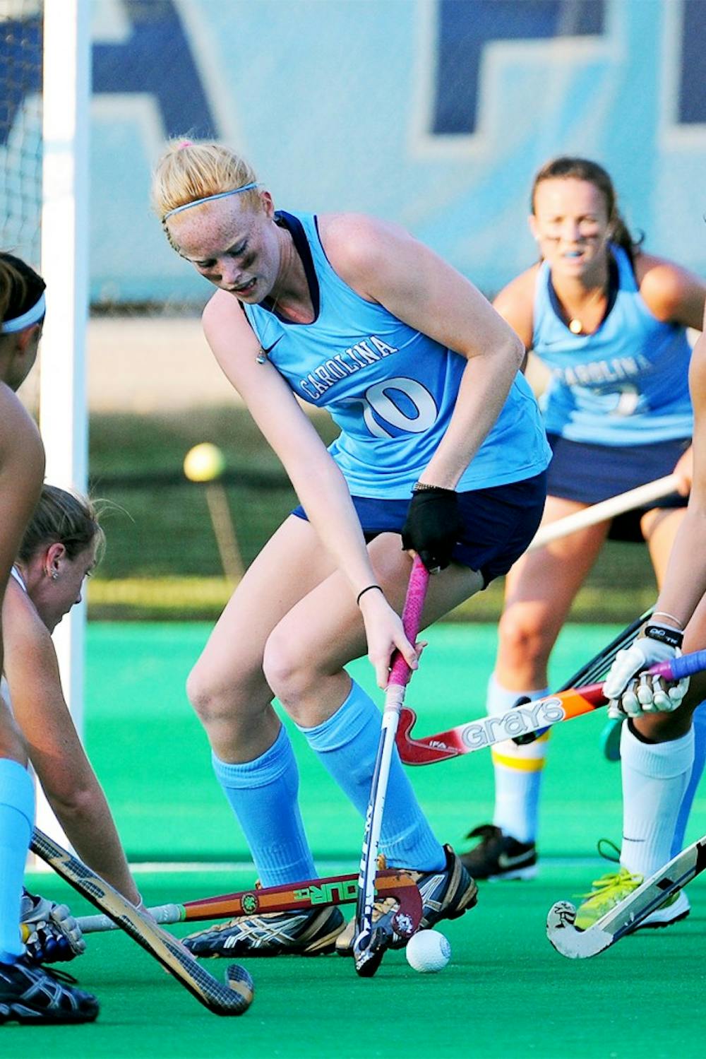 UNC back Nina Notman (10) protects the ball in the offensive zone.