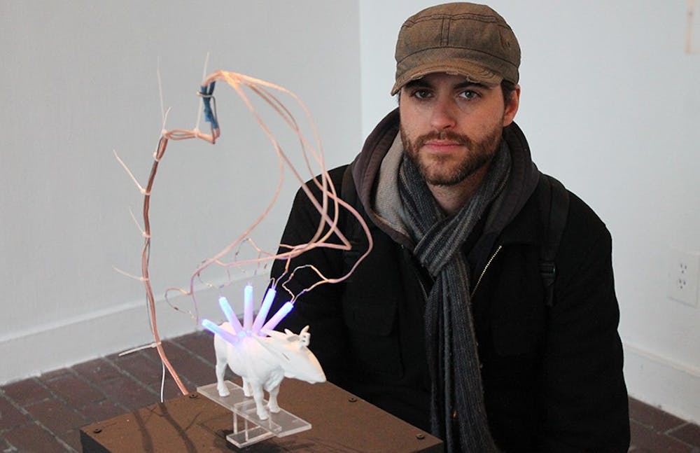 Lile Stephens is a MFA student at UNC-CH. His MFA thesis exhibition  "Operating Systems" is on display from February 10 - 14. There will be a reception, February 13, at 6pm for his exhibit. Stephens's favorite piece in his exhibit was his cow statue.