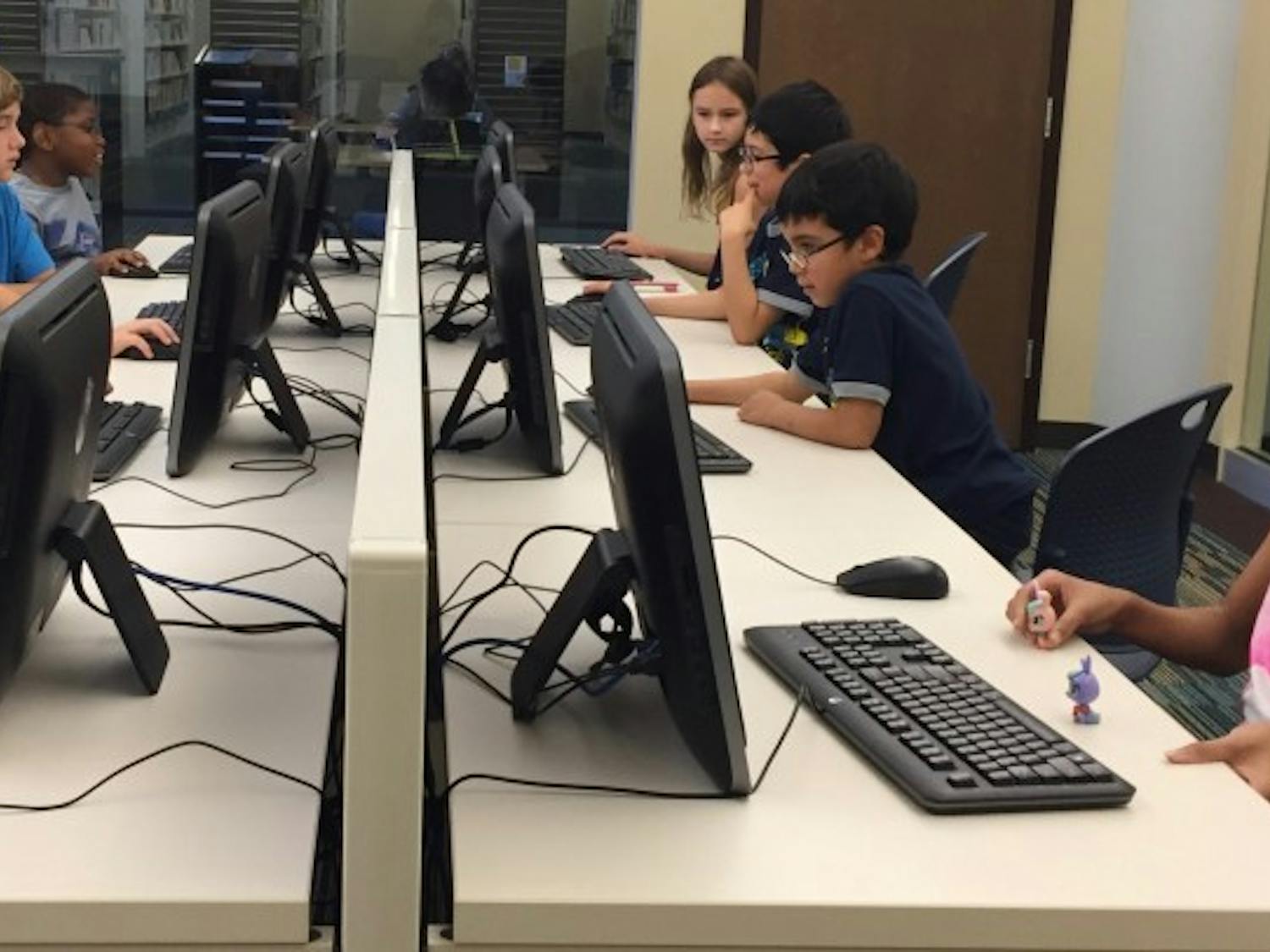 Kids Code, a startup featured at the 2019 Innovation Showcase, focuses on teaching children in low-income communities how to code. This photo was taken May 2017 during a Kids Code Saturday Workshop at the Southwest Chatham Live Oak Public Library in Savannah, Georgia, where the program originated. Contributed by Angel Patel.