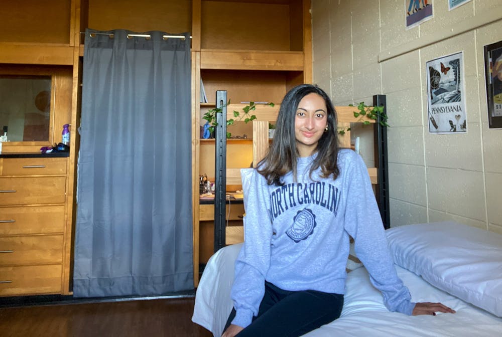 Rashika Rahman, a freshman at UNC, discussed the drinking culture on campus as a minority student. Rahman poses for a virtual portrait from her dorm room on Thursday, Apr. 01, 2021.