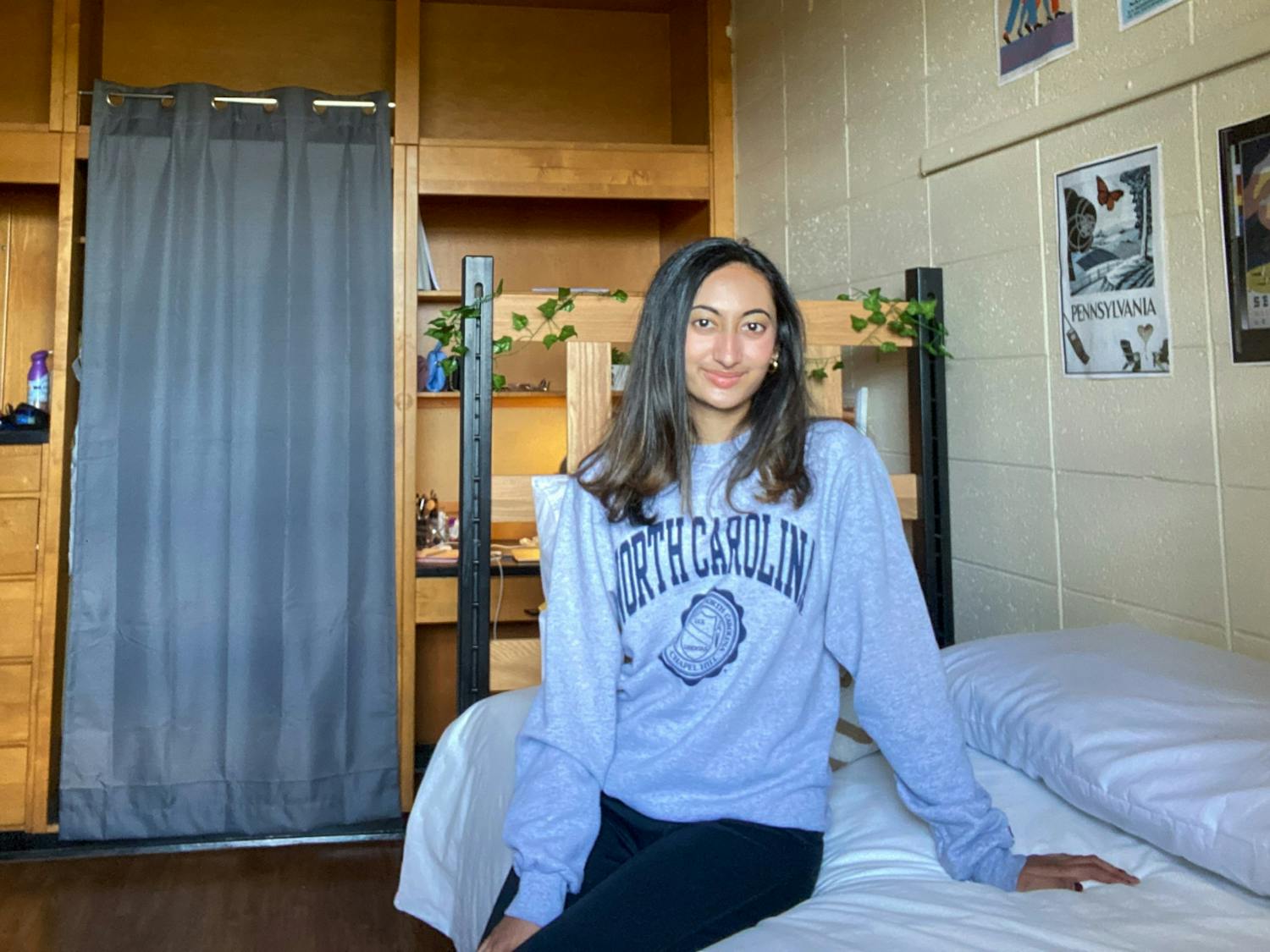 Rashika Rahman, a first-year at UNC, discussed what she thinks about drinking culture on campus at UNC as a minority student. Rahman poses for a virtual portrait from her dorm room on Thursday, Apr. 1, 2021.