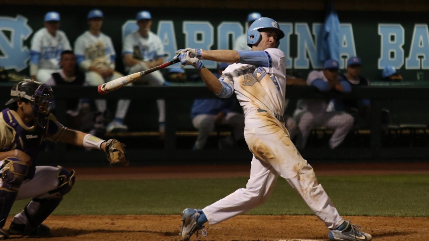 First baseman Ryan Miller (5) follow through on  swing in the bottom of the seventh inning during the North Carolina baseball team's 10-2 route of Western Carolina University on Tuesday.