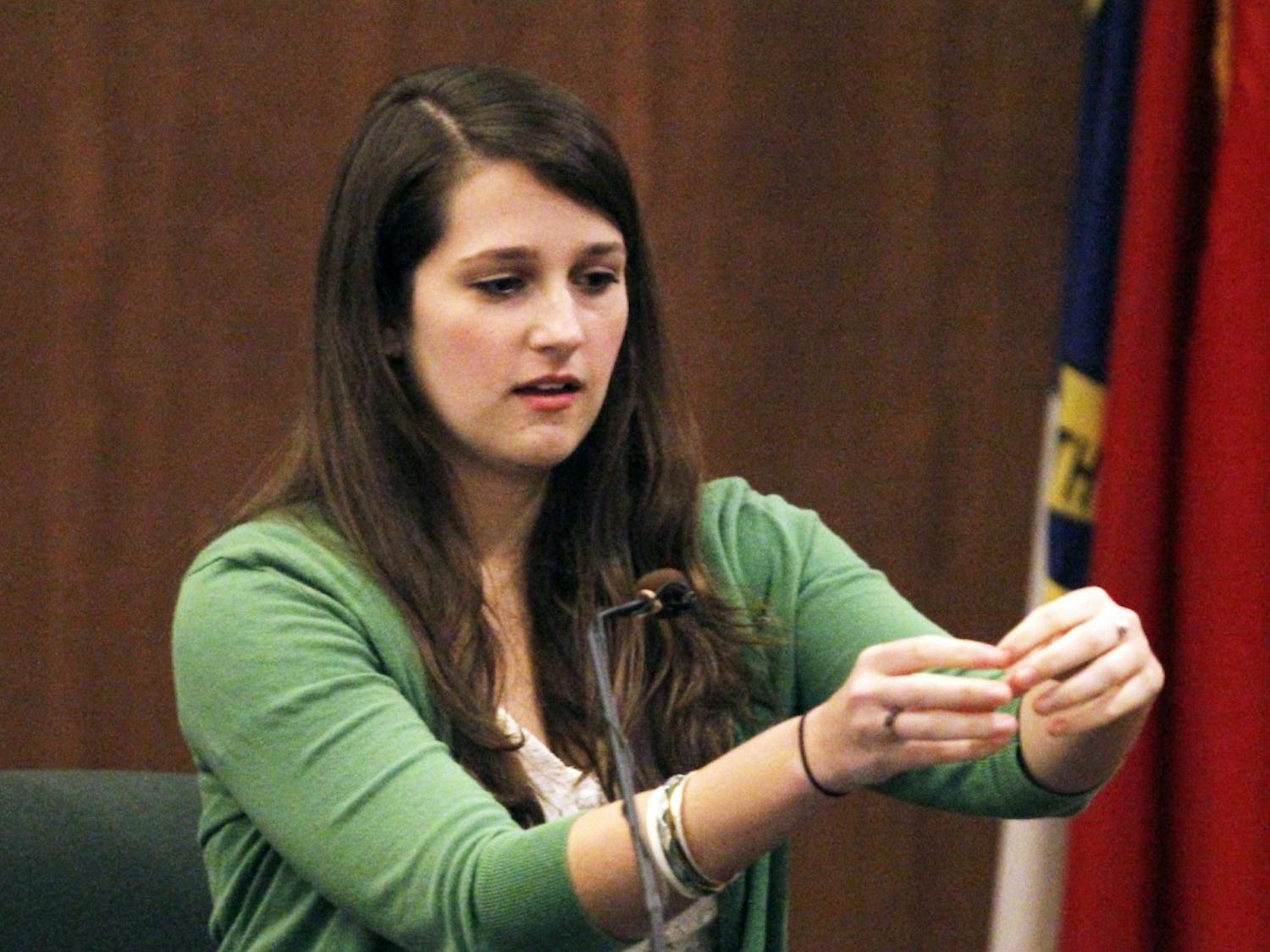 Former UNC student Caroline Harper describes where her car was parked near a dumpster outside of her UNC sorority early the morning of March 5, 2008 where she saw two young African-American males nearby. Harper was the second witness in the second day of testimony Thursday, Dec. 8, 2011 in the Battle Courtroom, Hillsborough, NC. The jury was allowed to hear her after the defense contended that her testimony would be prejudicial. Judge Allen Baddour allowed Harper's statements before the Lovette jury. 